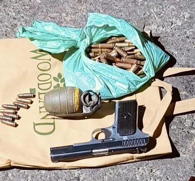 two terrorist associates held along with arms  ammunition in anantnag  police