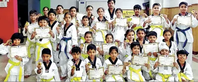 28 ashiana public school students earn taekwondo yellow belt