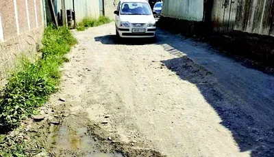 dilapidated road irks residents of shah e hamdan colony