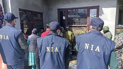 nia attaches four immovable properties  seizes rs  2 27 cr in handwara narco terror case