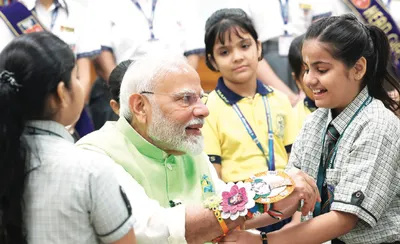 pm celebrates raksha bandhan with school girls in delhi