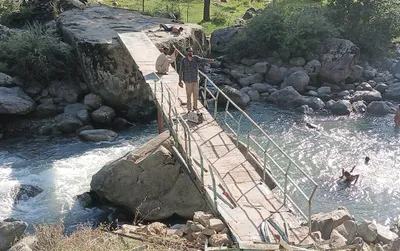 residents donate money to build footbridge in bandipora village