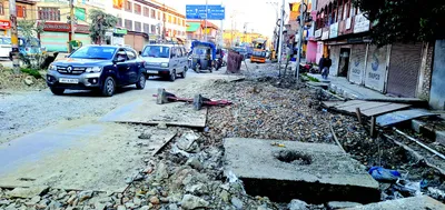 dilapidated roads continue to pester commuters in srinagar