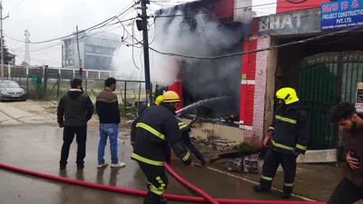 vehicle accessories shop damaged in fire in srinagar