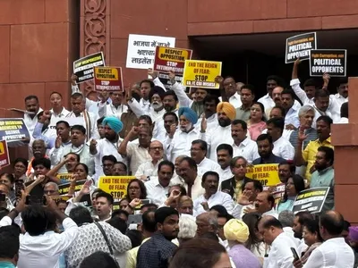 opposition mps protest in parliament premises against centre s  misuse  of ed  cbi
