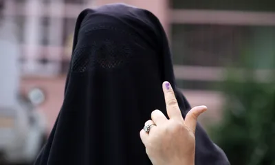 unusual sight in downtown  long queues outside polling booths