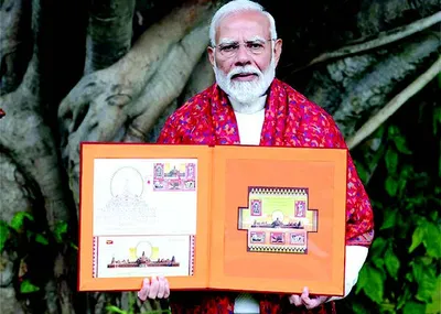 pm modi releases commemorative postage stamps on ram temple