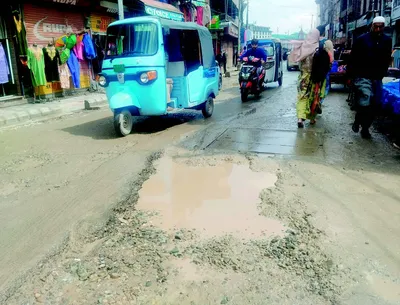 dilapidated roads hit vehicular movement in srinagar