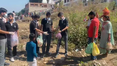 on last navratri day  college students remove garbage from tawi river in jammu