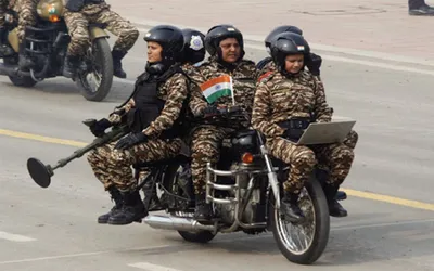 women display motorcycle daredevil stunts at r day parade