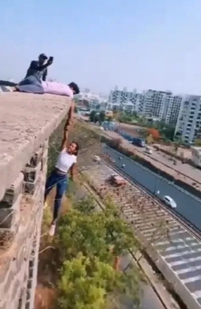 girl dangles mid air for reel  pune police nab 2 for daredevil stunt