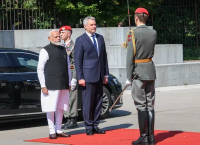 pm modi arrives in austria after successful russia visit