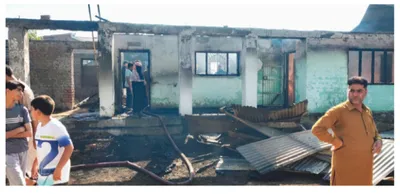 fire damages govt school building in sopore