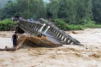 doda cloudburst   bridge washed away due to flash floods  over dozen villages cut off