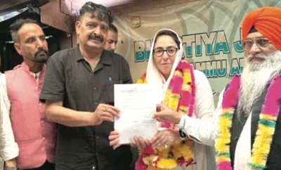 dr darakhshan hands over mandate letters to bjp candidates