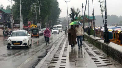 rains lash j k  more showers expected  met