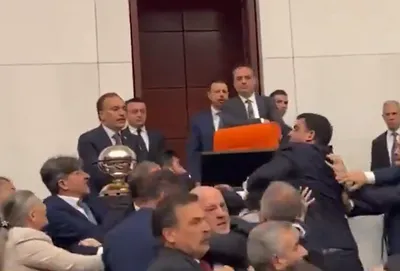 watch  turkish lawmakers exchange blows inside parliament