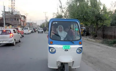 self reliance  kounsar jan becomes srinagar s first female e rickshaw driver