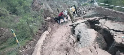 around 24 residential houses develop cracks as major portion of road collapses in j k s ramban