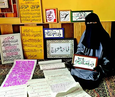 ink of devotion   bandipora girl brings out veiled artist in her