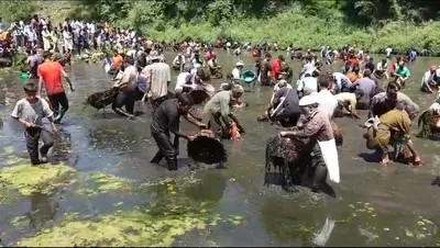 annual cleaning and fishing festival celebrated at south kashmir s panzath nag springs