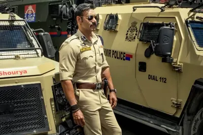 ajay devgn poses in singham avatar as cop from jammu and kashmir police