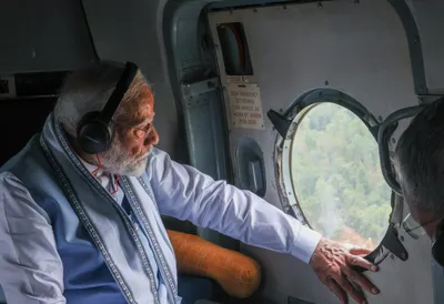 pm modi undertakes aerial survey of landslide hit wayanad