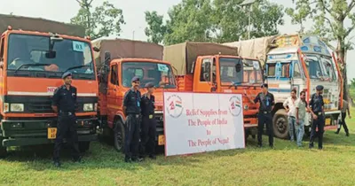 india hands over consignment of relief materials to flood hit nepal