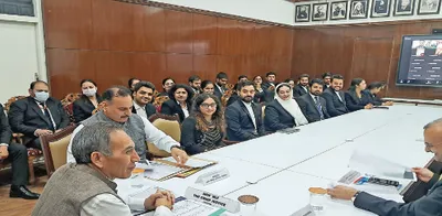 chief justice interacts with trainee judicial officers