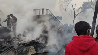 mla zadibal tanvir sadiq visits fire victims in rainawari srinagar