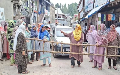 local residents hold protest against installation of smart meters in handwara