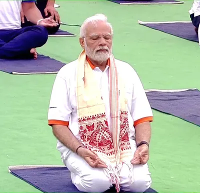 yoga enables us to navigate life s challenges with calm and fortitude  says pm modi
