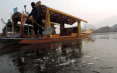 in pictures  parts of dal lake freeze as cold wave sweeps kashmir