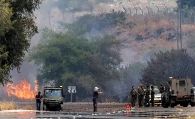 hezbollah  israel trade heavy fire following deadly israeli strike over south lebanon