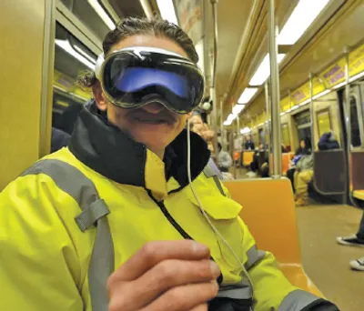 people wear apple vision pro on streets  inside trains