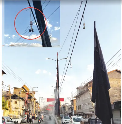 water foggers provide relief from scorching heat during muharram processions