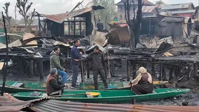 video   dal lake fire victims demand rehabilitation as dc srinagar visits scene