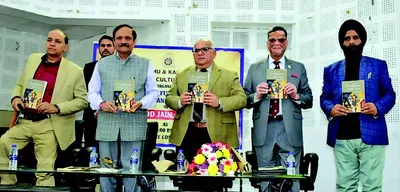 advisor bhatnagar releases pramod jain’s book