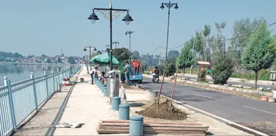 slow pace of work on footpath from nishat to habak irks pedestrians