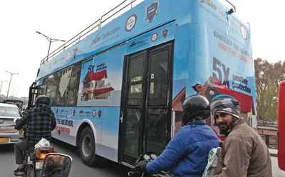 double decker buses cause traffic jams on boulevard road