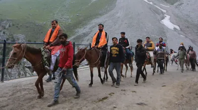 srinagar  another batch of pilgrims leave for amarnath yatra from pathna chowk base camp