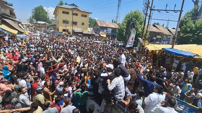 abrar ahmad holds roadshow in budgam to rally for his father er rasheed