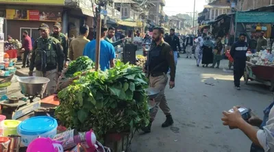 baramulla police launch drive to clear footpaths  roads from encroachments