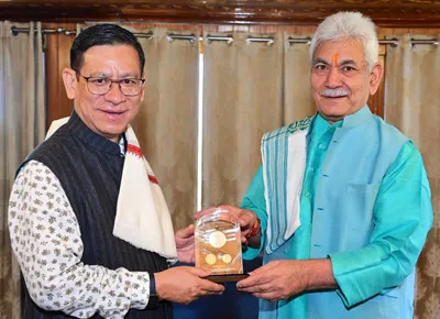 justice kotiswar singh calls on lieutenant governor manoj sinha