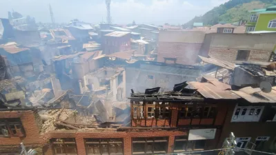 10 houses  8 shops gutted in devastating fire in anantnag
