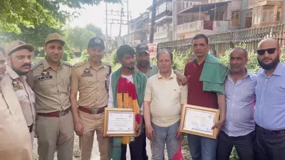 srinagar heroes honored for daring rescue of drowning boy in jhelum river