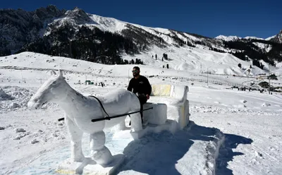 in frames  horse cart crafted in snow attracts visitors in sonamarg