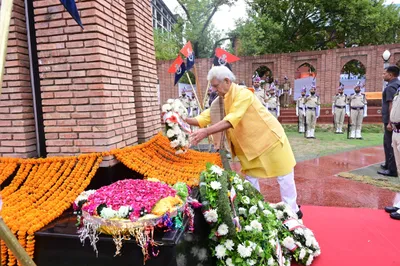 lg sinha inaugurates balidan stambh amid heavy rains in srinagar