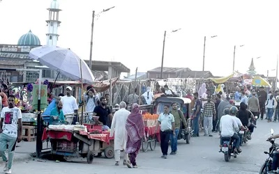 commuters decry blocking of road by street vendors at sarai bala