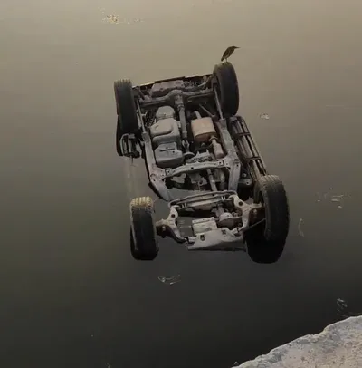 suv parked on dal lake banks slips into water body